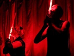 Andrew S. & Kelvikta Swallowing LED light swords