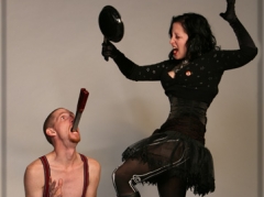 Andrew S. & Kelvikta hammering in swords with a frying pan!